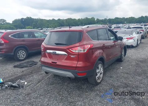 2014 Ford Escape Titanium z USA, uszkodzony, nr VIN 1FMCU9J99EUD14681